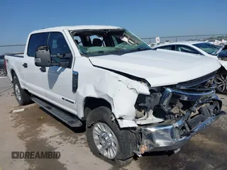 2022 Ford F-250 XL z VIN 1FT7W2BT9NEE21645, wystawiony jako IAAI lot #42013128 z przebiegiem 88 578 mil mil oraz . Historia ofert i sprzedaży dostępna na DreamBid. Obrazek 1.