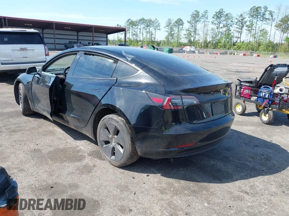 2023 Tesla Model 3 with VIN 5YJ3E1EA3PF681515, listed as a IAAI auction lot 41899053 with 15,985 mi miles and . Bid and sale history available at carsss.com. Image 3.