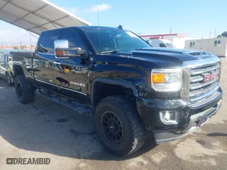 2017 GMC Sierra 2500HD SLT with VIN 1GT12TEY9HF130351, listed as a IAAI auction lot 41503777 with 105,756 mi miles. Bid and sale history available at carsss.com. Image 1.