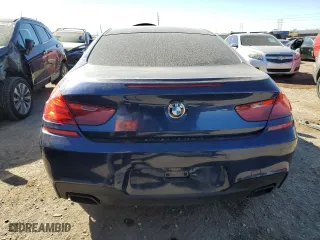 2012 BMW 6 Series 650i with VIN WBALX3C52CDV77706, listed as a Copart auction lot 77685994 with 81,514 mi miles and Salvage Title. Bid and sale history available at carsss.com. Image 6.