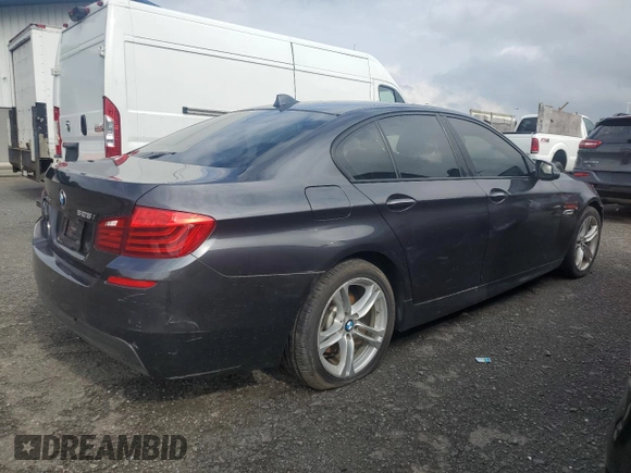 2014 BMW 5 Series 528i xDrive with VIN WBA5A7C52ED616475, listed as a Copart auction lot 64597745 with 91,306 mi miles and Salvage title. Bid and sale history available at DreamBid. Image 3.