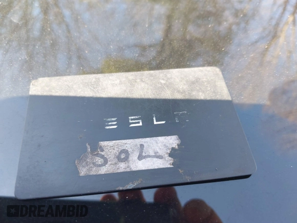 2022 Tesla Model 3 with VIN 5YJ3E1EA5NF168201, listed as a IAAI auction lot 41855273 with 31,393 mi miles and . Bid and sale history available at DreamBid. Image 11.