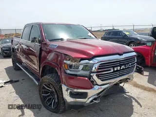 2019 Ram 1500 Laramie with VIN 1C6SRFRT6KN653315, listed as a IAAI auction lot 42264857 with Not provided miles and . Bid and sale history available at DreamBid. Image 1.