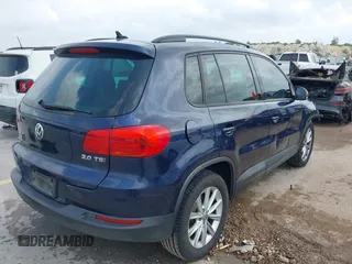 2015 Volkswagen Tiguan SE with VIN WVGAV7AX1FW508313, listed as a IAAI auction lot 42120704 with 136,405 mi miles and . Bid and sale history available at DreamBid. Image 4.