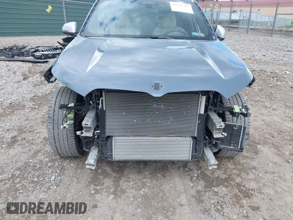 2023 BMW X1 xDrive28i z VIN WBX73EF06P5W75006, wystawiony jako IAAI lot #42235317 z przebiegiem 22 890 mil mil oraz . Historia ofert i sprzedaży dostępna na DreamBid. Obrazek 6.