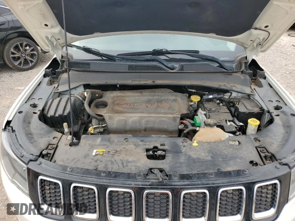 2018 Jeep Compass Sport z VIN 3C4NJCAB3JT123431, wystawiony jako Copart lot #63045144 z przebiegiem 118 849 mil mil oraz Szkoda całkowita • Salvage title. Historia ofert i sprzedaży dostępna na DreamBid. Obrazek 12.