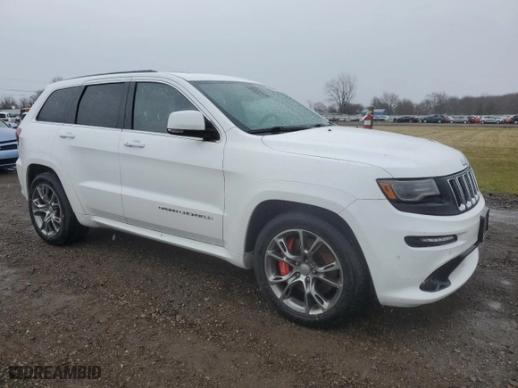 2015 Jeep Grand Cherokee SRT with VIN 1C4RJFDJ6FC941941, listed as a Copart auction lot 50613315 with 173,992 mi miles and Salvage Title. Bid and sale history available at carsss.com. Image 4.