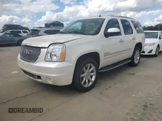 2011 GMC Yukon Denali with VIN 1GKS2EEF8BR367552, listed as a Copart auction lot 74142084 with 151,855 mi miles and Salvage Title. Bid and sale history available at carsss.com. Image 1.