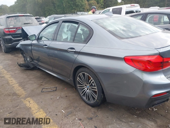 2018 BMW 5 Series M550i xDrive with VIN WBAJB9C53JB286035, listed as a IAAI auction lot 40590380 with 57,072 mi miles and . Bid and sale history available at carsss.com. Image 14.