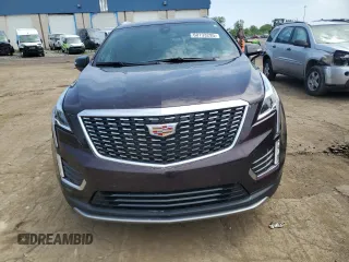 2021 Cadillac XT5 FWD Premium Luxury with VIN 1GYKNCRS9MZ217560, listed as a Copart auction lot 60733295 with 52,242 mi miles and Salvage title. Bid and sale history available at DreamBid. Image 5.