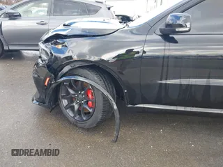 2023 Dodge Durango SRT Hellcat Premium with VIN 1C4SDJH90PC557375, listed as a IAAI auction lot 41328850 with 30,697 mi miles and . Bid and sale history available at DreamBid. Image 20.