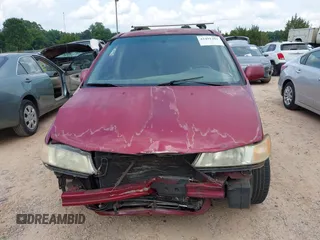 2002 Honda Odyssey EX with VIN 5FNRL18612B028570, listed as a IAAI auction lot 42491201 with 203,401 mi miles and . Bid and sale history available at DreamBid. Image 13.
