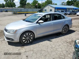 2013 Volkswagen Jetta Hybrid SEL Premium with VIN 3VW637AJ9DM311881, listed as a Copart auction lot 59708715 with 98,205 mi miles and Salvage title. Bid and sale history available at DreamBid. Image 1.