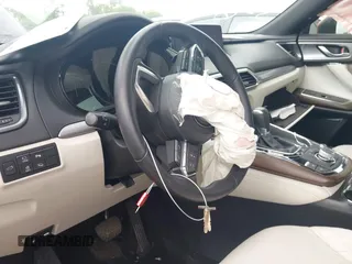 2021 Mazda CX-9 Signature with VIN JM3TCBEY9M0500122, listed as a IAAI auction lot 42252561 with 46,154 mi miles and . Bid and sale history available at DreamBid. Image 11.