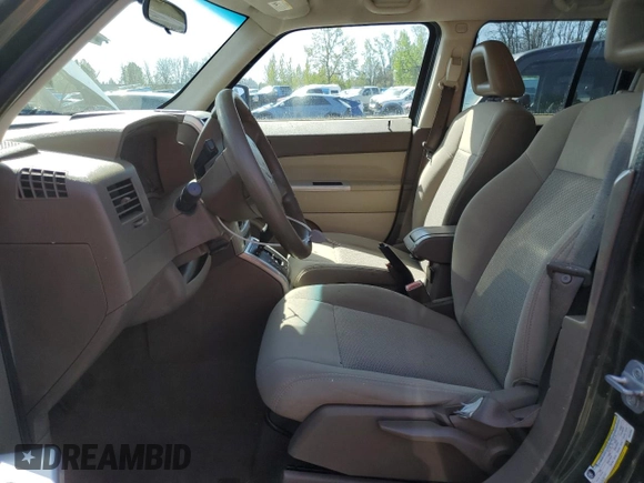 2008 Jeep Patriot Sport z VIN 1J8FF28W38D543935, wystawiony jako Copart lot #53519445 z przebiegiem 169 618 mil mil oraz Czysty tytuł • Clean title. Historia ofert i sprzedaży dostępna na DreamBid. Obrazek 7.