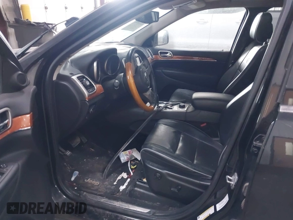 2013 Jeep Grand Cherokee Overland with VIN 1C4RJFCT7DC524005, listed as a IAAI auction lot 42116097 with 126,942 mi miles. Bid and sale history available at carsss.com. Image 5.