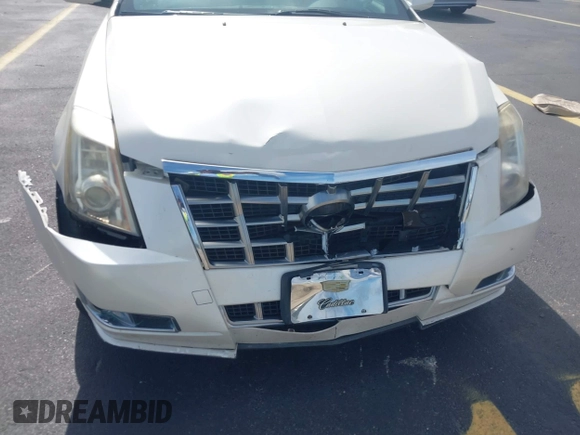 2014 Cadillac CTS Performance with VIN 1G6DC1E39E0132332, listed as a IAAI auction lot 42485811 with 109,899 mi miles and . Bid and sale history available at DreamBid. Image 6.