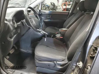 2008 Kia Rondo LX Base with VIN KNAFG525287212765, listed as a Copart auction lot 87700005 with 286,337 mi miles and Salvage Title. Bid and sale history available at carsss.com. Image 7.