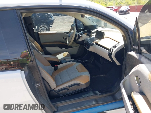 2015 BMW i3 z VIN WBY1Z4C58FV501754, wystawiony jako IAAI lot #42220253 z przebiegiem 59 022 mil mil oraz . Historia ofert i sprzedaży dostępna na DreamBid. Obrazek 5.