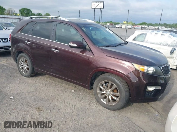 2011 Kia Sorento SX with VIN 5XYKW4A28BG127753, listed as a IAAI auction lot 42033754 with 163,470 mi miles. Bid and sale history available at carsss.com. Image 1.