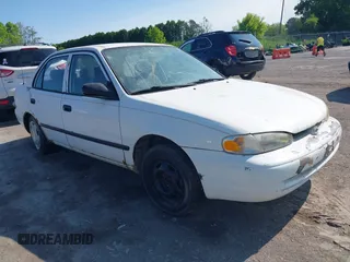 1998 Chevrolet Prizm Lsi z VIN 1Y1SK5281WZ420918, wystawiony jako IAAI lot #42360651 z przebiegiem 108 178 mil mil oraz . Historia ofert i sprzedaży dostępna na DreamBid. Obrazek 1.