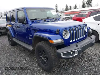 2019 Jeep Wrangler Unlimited Sahara with VIN 1C4HJXEG2KW609315, listed as a IAAI auction lot 41144404 with 55,266 mi miles and . Bid and sale history available at DreamBid. Image 1.