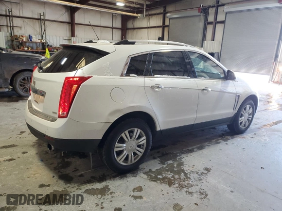 2015 Cadillac SRX Luxury Collection z VIN 3GYFNBE38FS618933, wystawiony jako Copart lot #45332835 z przebiegiem 64 819 mil mil oraz Szkody całkowita. Historia ofert i sprzedaży dostępna na DreamBid. Obrazek 3.