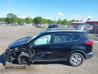 2014 Toyota RAV4 LE with VIN 2T3BFREV4EW211446, listed as a IAAI auction lot 42189613 with 114,795 mi miles and . Bid and sale history available at DreamBid. Image 14.