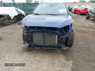 2022 Toyota Corolla Cross LE with VIN 7MUCAABG1NV042004, listed as a IAAI auction lot 42352160 with 58,442 mi miles and . Bid and sale history available at DreamBid. Image 6.