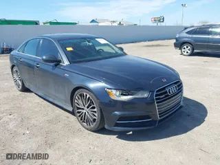 2016 Audi A6 3.0T Premium Plus with VIN WAUFGAFC9GN003180, listed as a IAAI auction lot 41630047 with 124,516 mi miles. Bid and sale history available at carsss.com. Image 1.
