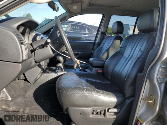 2003 Jeep Grand Cherokee with VIN 1J8GW48N43C593488, listed as a Copart auction lot 60466805 with 70,882 mi miles and Salvage title. Bid and sale history available at DreamBid. Image 7.
