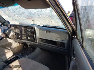 1996 Jeep Cherokee Sport with VIN 1J4FT68S6TL214000, listed as a IAAI auction lot 41481810 with 148,098 mi miles. Bid and sale history available at carsss.com. Image 5.