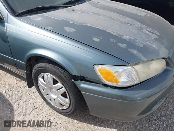 2001 Toyota Camry CE z VIN JT2BG22K310536515, wystawiony jako IAAI lot #42409847 z przebiegiem 205 978 mil mil oraz . Historia ofert i sprzedaży dostępna na DreamBid. Obrazek 12.