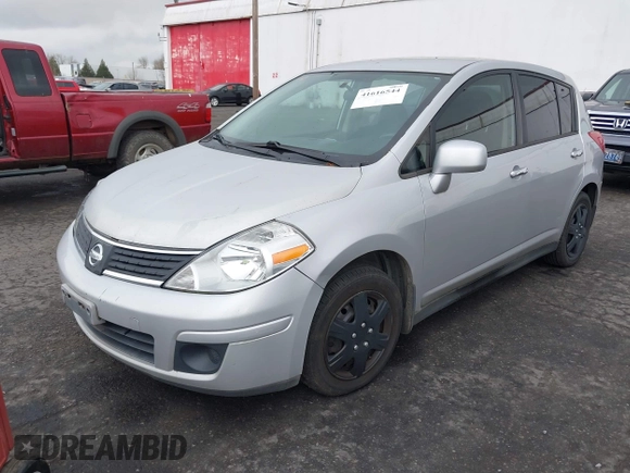 2009 Nissan Versa 1.8 SL with VIN 3N1BC13E19L500653, listed as a IAAI auction lot 41616544 with 138,554 mi miles. Bid and sale history available at carsss.com. Image 2.