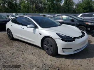 2023 Tesla Model 3 with VIN 5YJ3E1EA6PF396808, listed as a Copart auction lot 50606185 with 27,838 mi miles and Salvage Title. Bid and sale history available at carsss.com. Image 4.