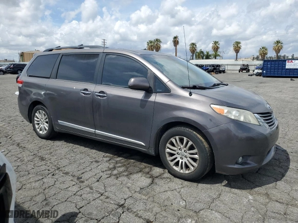 2013 Toyota Sienna XLE AAS with VIN 5TDYK3DC5DS336135, listed as a Copart auction lot 51143765 with 98,235 mi miles and Salvage Title. Bid and sale history available at carsss.com. Image 4.