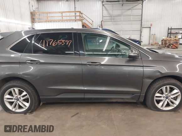 2015 Ford Edge SEL with VIN 2FMTK4J89FBB69648, listed as a IAAI auction lot 41765397 with 160,508 mi miles. Bid and sale history available at carsss.com. Image 14.