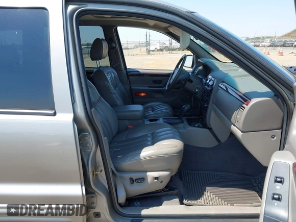 2000 Jeep Grand Cherokee Limited with VIN 1J4GW58N5YC361724, listed as a IAAI auction lot 42722980 with 136,590 mi miles and . Bid and sale history available at DreamBid. Image 5.