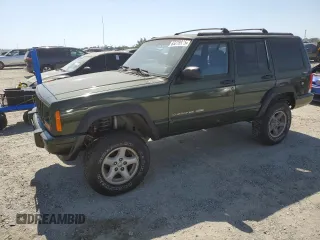 1998 Jeep Cherokee Sport z VIN 1J4FJ68S3WL150458, wystawiony jako Copart lot #63278935 z przebiegiem 176 314 mil mil oraz Czysty tytuł • Clean title. Historia ofert i sprzedaży dostępna na DreamBid. Obrazek 1.