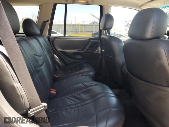2004 Jeep Grand Cherokee Laredo with VIN 1J4GW48S24C343496, listed as a Copart auction lot 51631915 with 186,216 mi miles and Salvage Title. Bid and sale history available at carsss.com. Image 11.