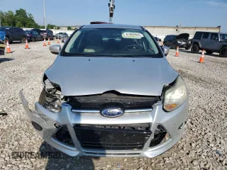 2013 Ford Focus SE with VIN 1FADP3F20DL142026, listed as a Copart auction lot 61855025 with 148,851 mi miles and Salvage title. Bid and sale history available at DreamBid. Image 5.