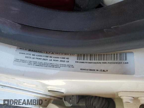 2017 Maserati Ghibli S Q4 z VIN ZAM57RTA6H1247079, wystawiony jako Copart lot #52099755 z przebiegiem 124 159 mil mil oraz Szkody całkowita. Historia ofert i sprzedaży dostępna na DreamBid. Obrazek 12.