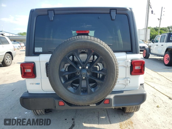 2021 Jeep Wrangler Unlimited Sahara z VIN 1C4JJXP63MW720948, wystawiony jako Copart lot #57115825 z przebiegiem 33 391 mil mil oraz Szkoda całkowita • Salvage title. Historia ofert i sprzedaży dostępna na DreamBid. Obrazek 6.