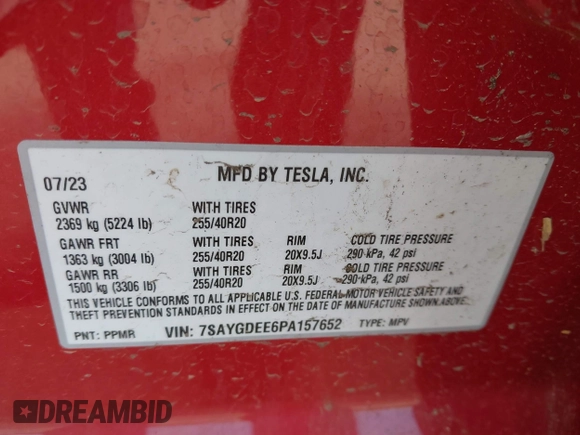 2023 Tesla Model Y Long Range with VIN 7SAYGDEE6PA157652, listed as a IAAI auction lot 41866777 with 22,584 mi miles. Bid and sale history available at carsss.com. Image 9.
