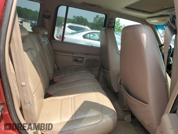 2000 Ford Explorer XLT with VIN 1FMZU73E4YZA72348, listed as a Copart auction lot 59015585 with 182,606 mi miles and Salvage title. Bid and sale history available at DreamBid. Image 11.