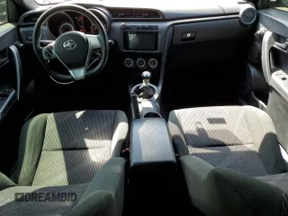 2012 Scion tC z VIN JTKJF5C76C3034769, wystawiony jako Copart lot #52517495 z przebiegiem 205 501 mil mil oraz Nie do naprawy. Historia ofert i sprzedaży dostępna na DreamBid. Obrazek 8.