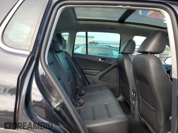 2013 Volkswagen Tiguan SE z VIN WVGBV7AXXDW534779, wystawiony jako Copart lot #77397164 z przebiegiem 149 285 mil mil oraz Szkoda całkowita • Salvage title. Historia ofert i sprzedaży dostępna na DreamBid. Obrazek 11.