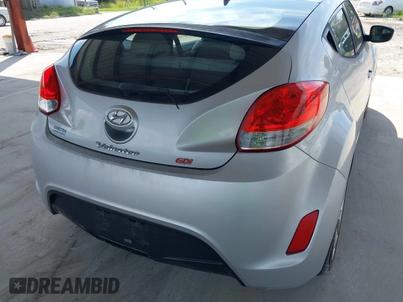 2012 Hyundai Veloster w/Gray Int z VIN KMHTC6ADXCU056898, wystawiony jako IAAI lot #40366687 z przebiegiem 137 161 mil mil oraz . Historia ofert i sprzedaży dostępna na DreamBid. Obrazek 13.