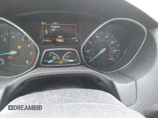 2017 Ford Focus SE z VIN 1FADP3F26HL233226, wystawiony jako IAAI lot #42004148 z przebiegiem 75 180 mil mil oraz . Historia ofert i sprzedaży dostępna na DreamBid. Obrazek 7.