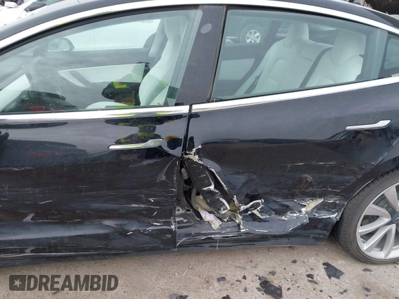 2018 Tesla Model 3 Long Range Battery with VIN 5YJ3E1EB9JF188437, listed as a IAAI auction lot 41371254 with 55,934 mi miles and . Bid and sale history available at DreamBid. Image 6.